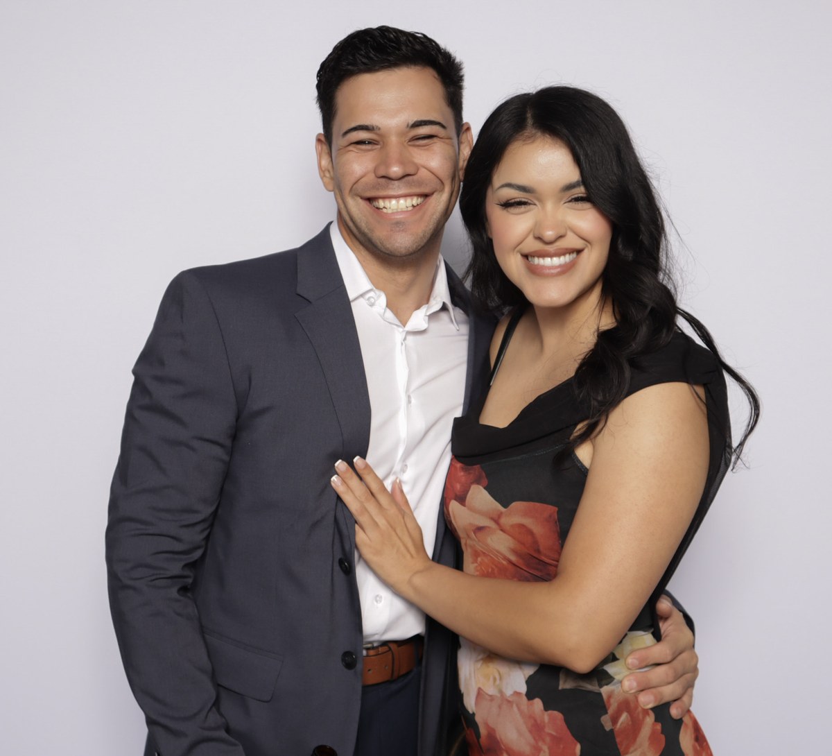 Guests posing together at the photo booth